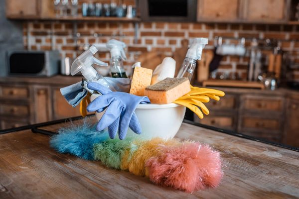 close-up-view-of-cleaning-supplies-on-wooden-table-2024-11-19-15-44-08-utc