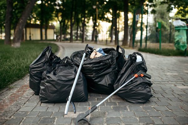 full-trash-bags-in-park-volunteering-motivator-2023-11-27-05-31-12-utc